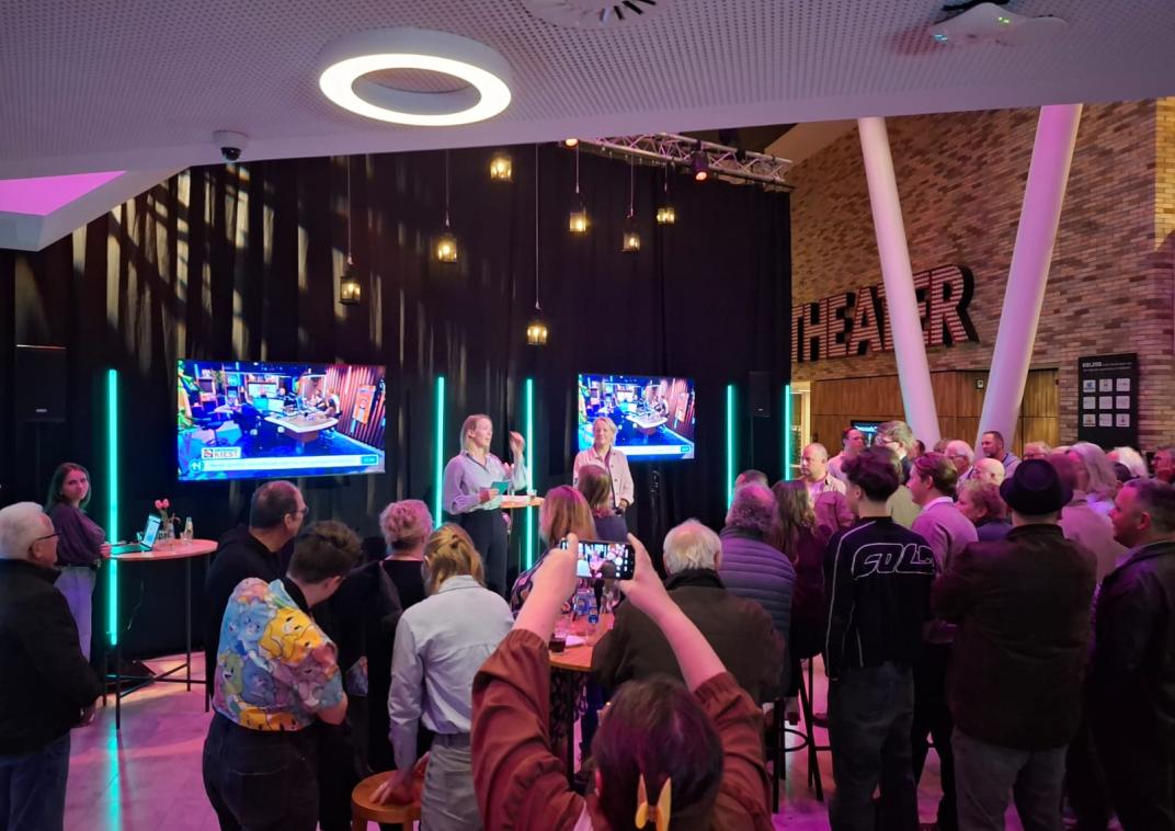 Presentatie bezoekers uitslagenavond